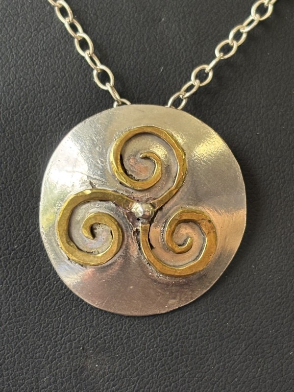 Domed Triskelion pendant - Sterling silver  & brass
