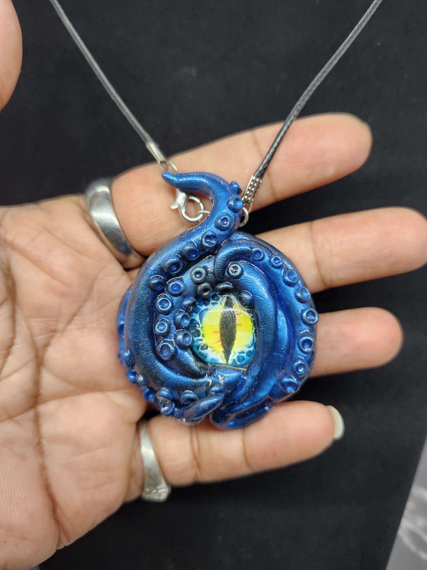 Polymer clay dragon eye pendant