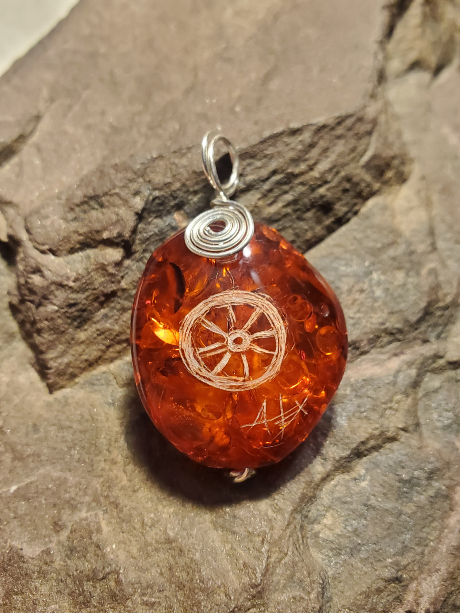 Silver Wheel Amber Intaglio Pendant