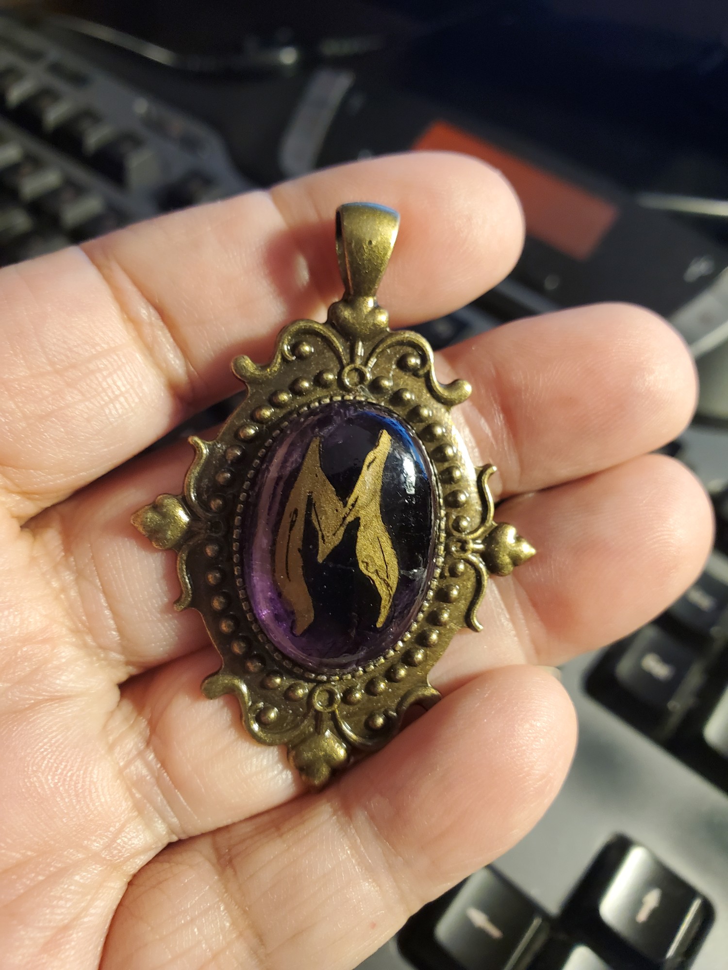 Maunche East Kingdom Amethyst in Bronze Pendant