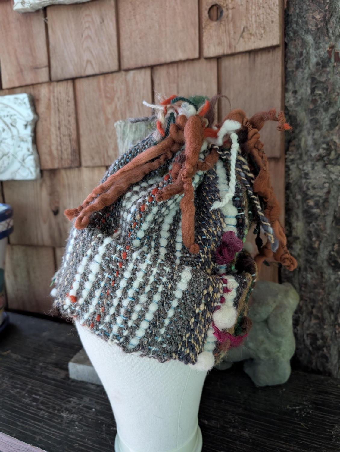 Woven, handspun, hand dyed wool hat. Funky and fun. Nice and warm.