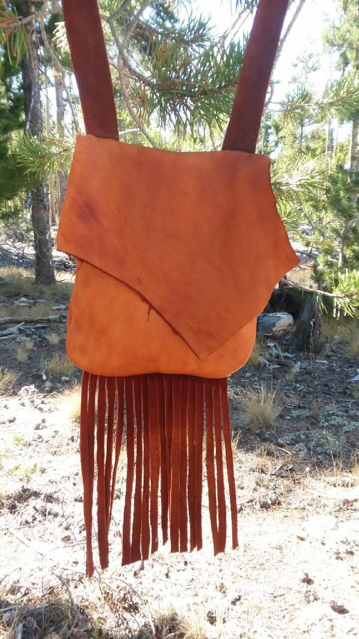 Handmade deer hide leather crossbody pouch with fringe