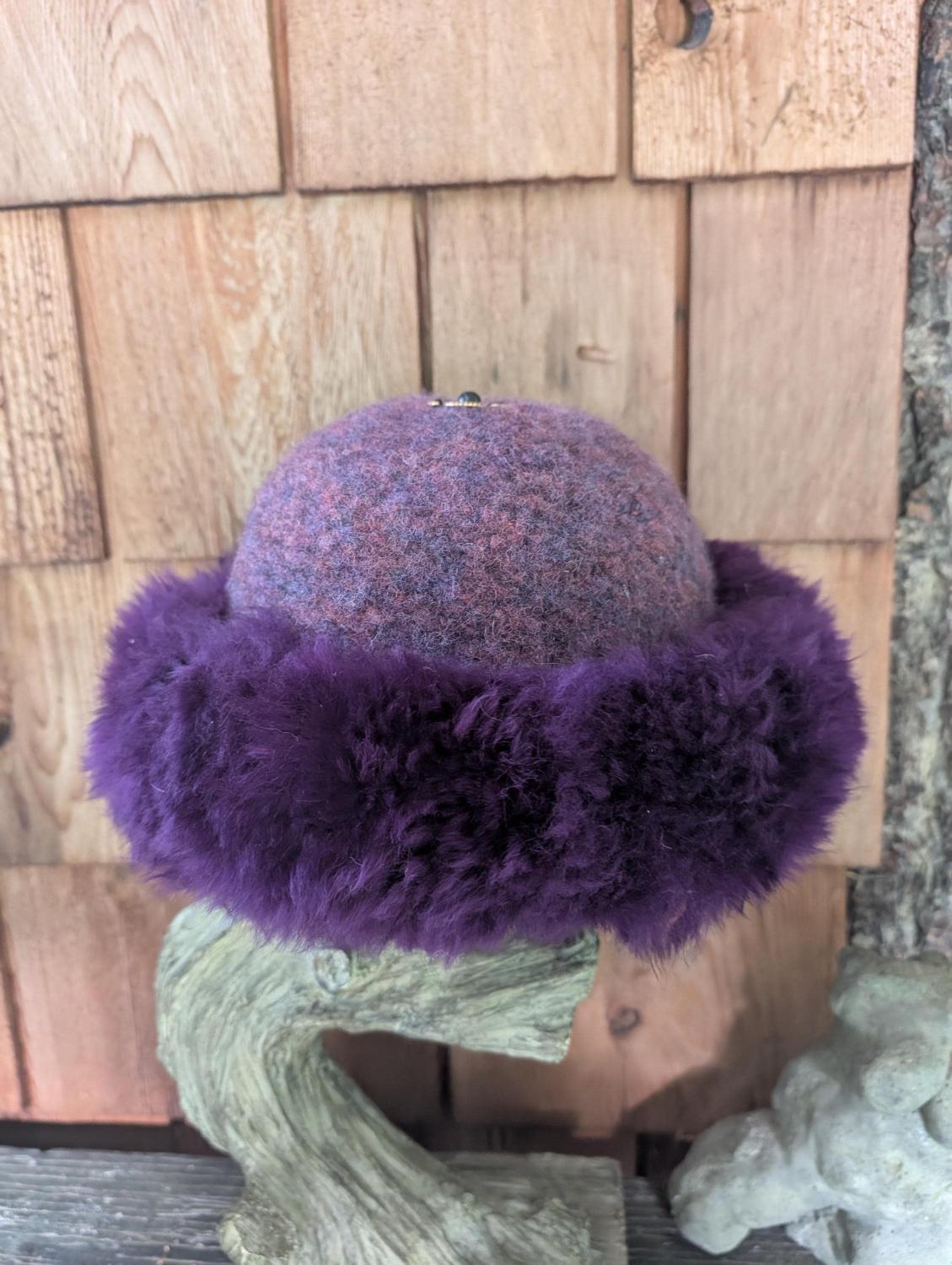 Felted, wool purple hat. Sheepskin  Nice and warm.