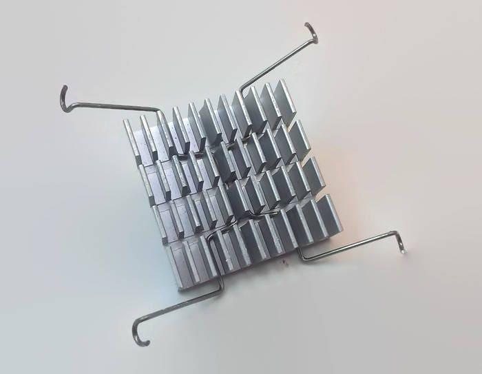 Computer motherboard chipset heat sink pin