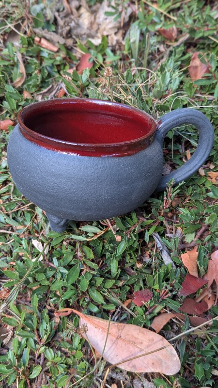 Red and black cauldron mug