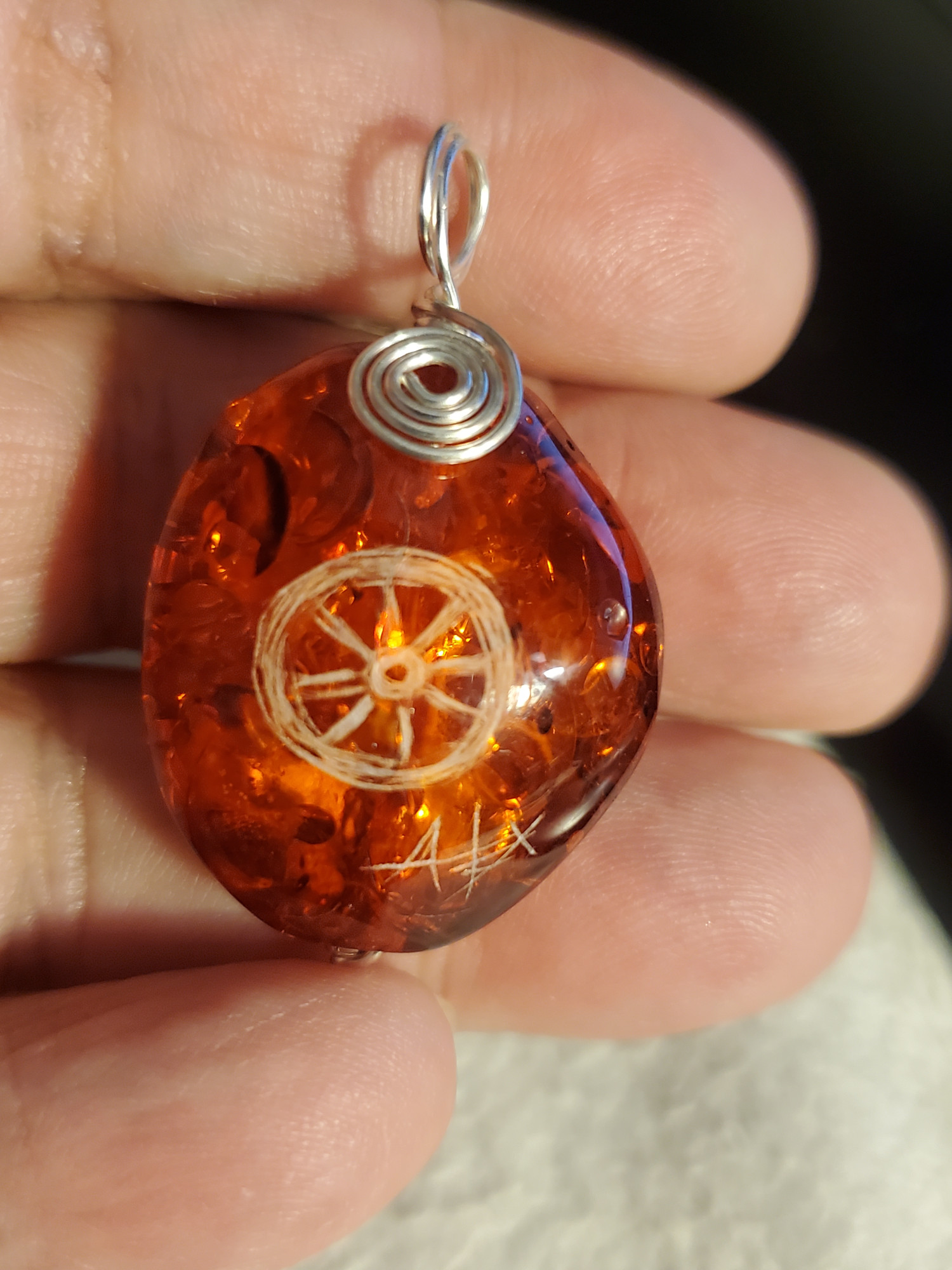Silver Wheel Amber Intaglio Pendant