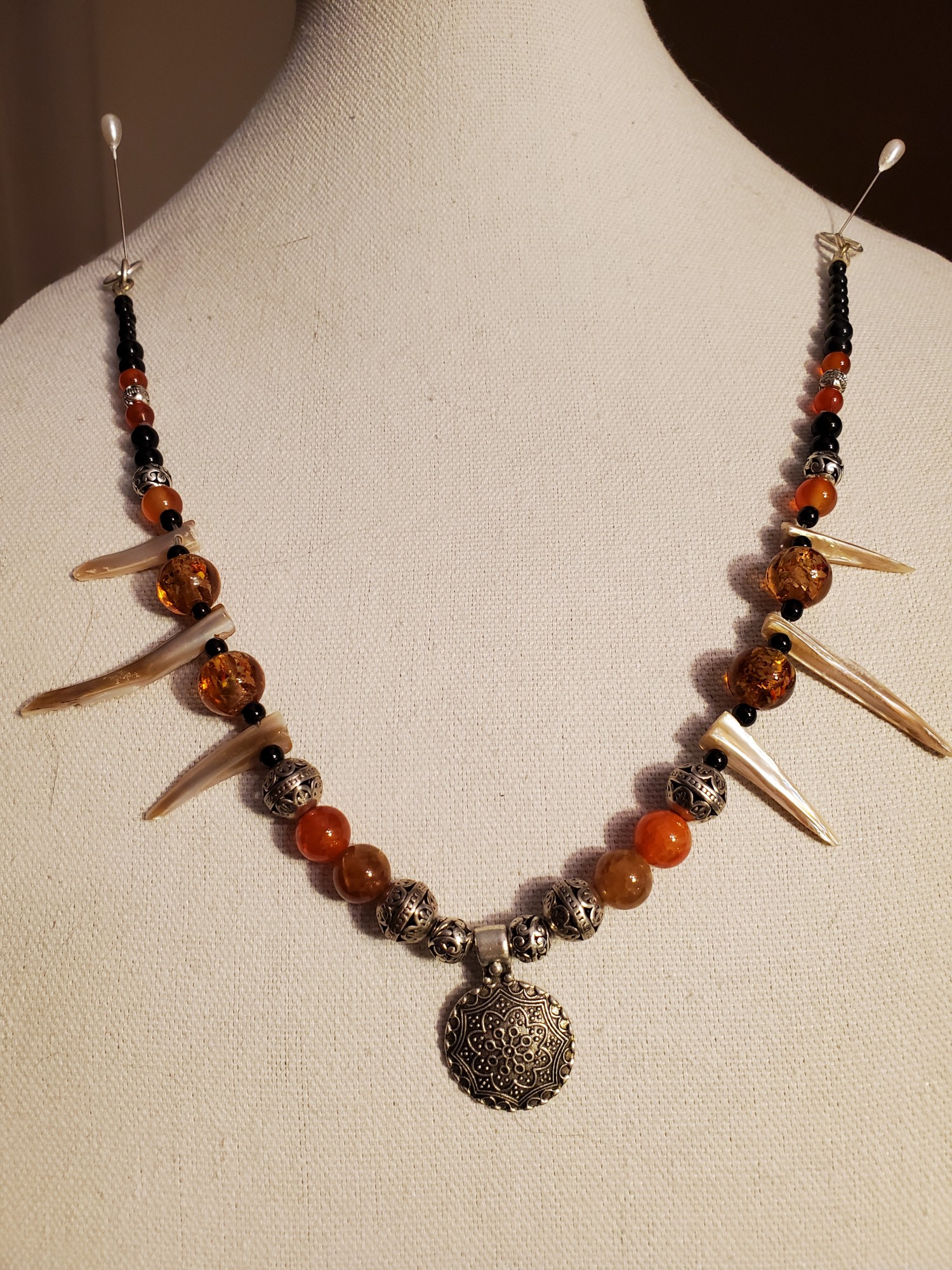 Viking Festoon Abalone Wolf Teeth